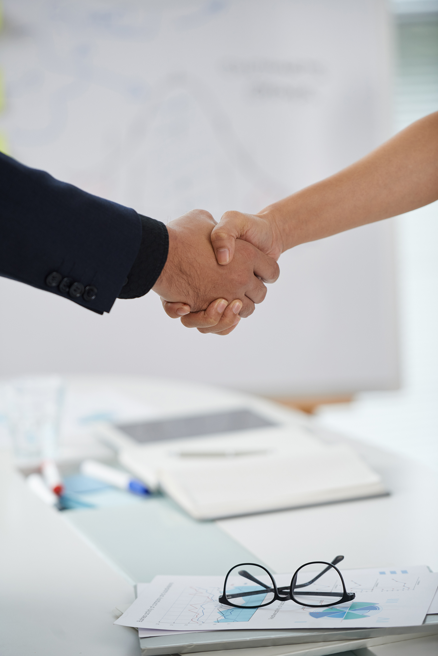 unrecognizable-man-woman-shaking-hands-meeting-start
